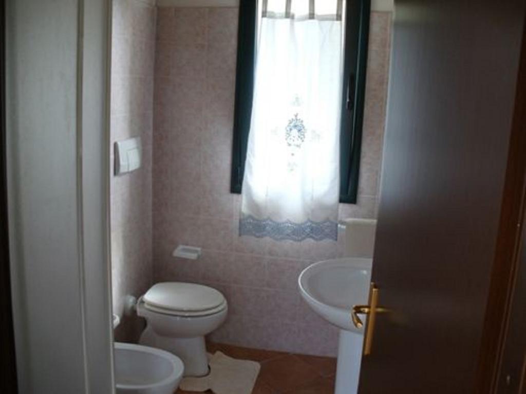 Farm Stay Gli Oleandri Loiri Porto San Paolo Habitación foto